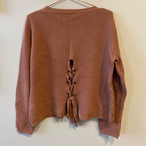 Knit crew sweater with lace-up back